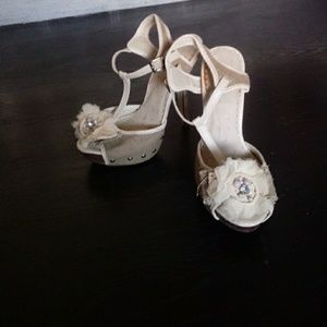 Not rated cream heels